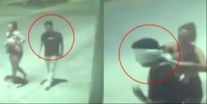 La mujer le tapó la cara a su novio con un buzo.